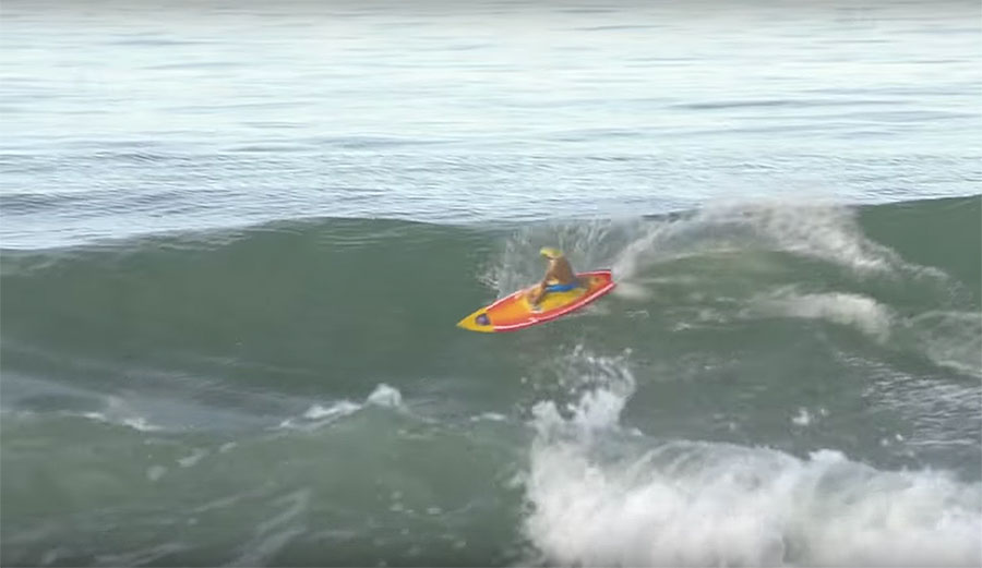 Larry Howlett figured out how to actually surf the way he wants to mind surf. What's he riding? A custom Maui RC Surfer called In Da Tube.