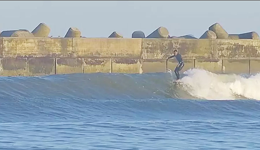 At the Katakai Fishing Port in Chiba, Japan, Shitoh Shigenaki hauls out a 9'6 to greet a swell that was a long time coming.