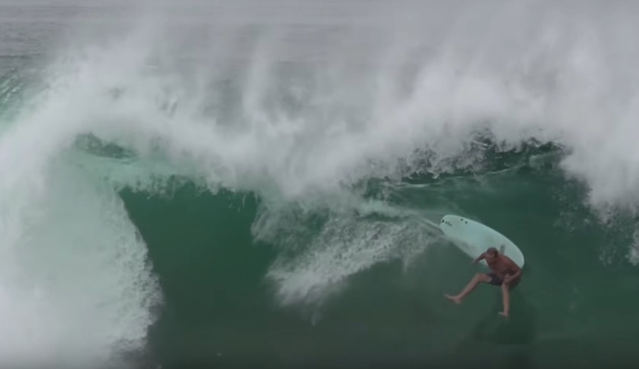 Jamie O'Brien isn't above taking a few lumps for the fruits of pulling into a Wedge cavern. Photo: Steve Cummings