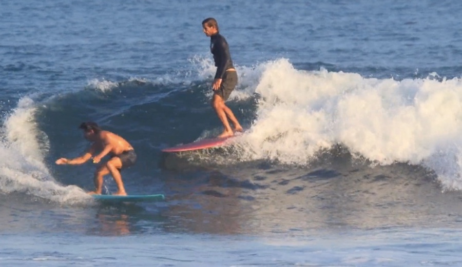 Jared Mell and Joel Tudor expertly split a wave at Malibu. Photo: Jack Coleman