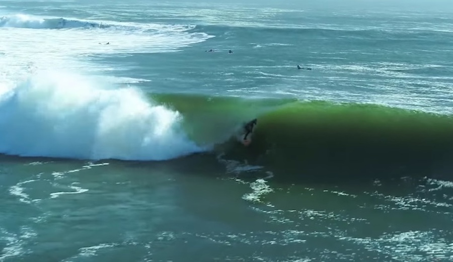 John Mel sneaks into a 10-barrel wave at Skeleton Bay. Photo: Screenshot/YouTube