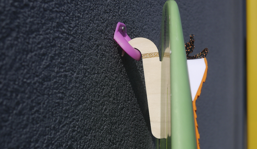 A wooden hook screws into your fin box and attaches to a plastic mount. Photo: SHEPP Solutions