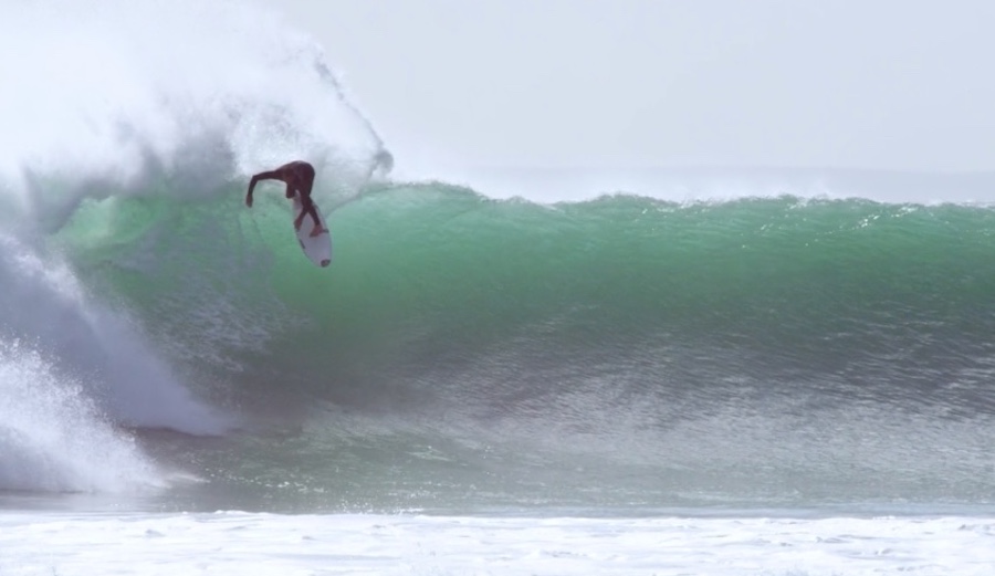 Oli Adams tears into a New Zealand wall.
