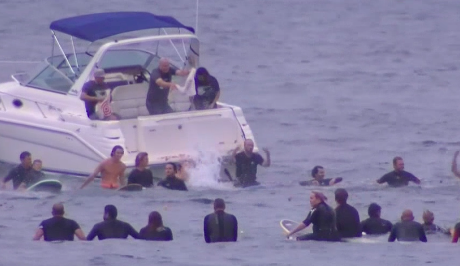 Hundreds paddled out at Carlsbad State Beach on Wednesday to remember Adam "Biff" D'Esposito, the surfer who was recently found dead in Rosarito, Mexico. Photo: NBC 7