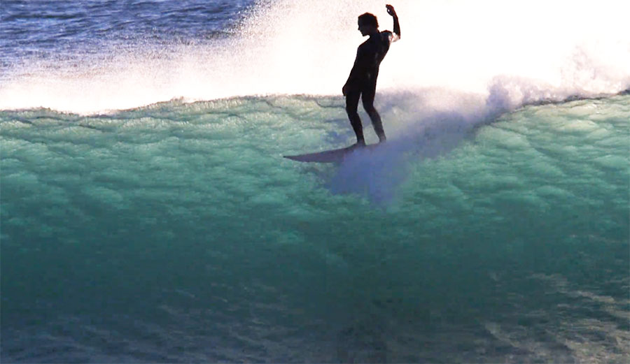 Alex Knost surfing