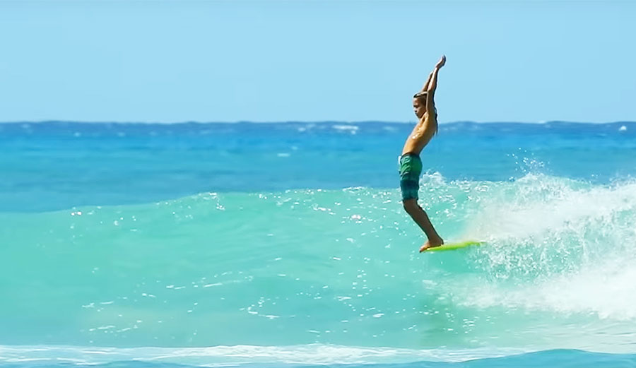 John Michael Van Hohenstein surfs Queen's at Waikiki