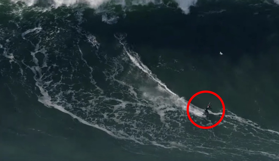 Tom Butler believes he may have broken the world record for biggest wave ridden with this estimated 100-foot bomb at Nazaré. Photo: Pedro Miranda