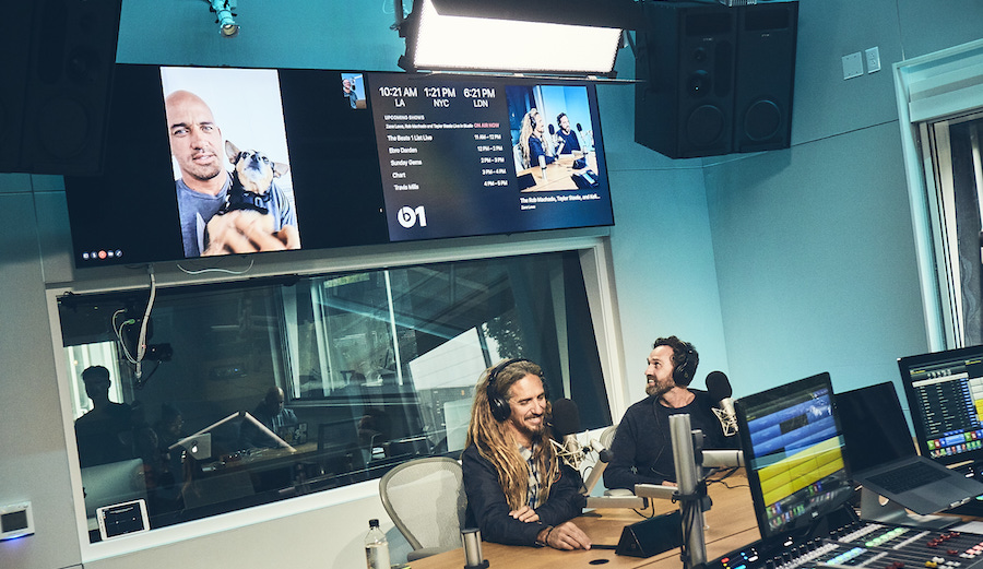 Kelly Slater in the studio with Rob Machado and Taylor Steele.