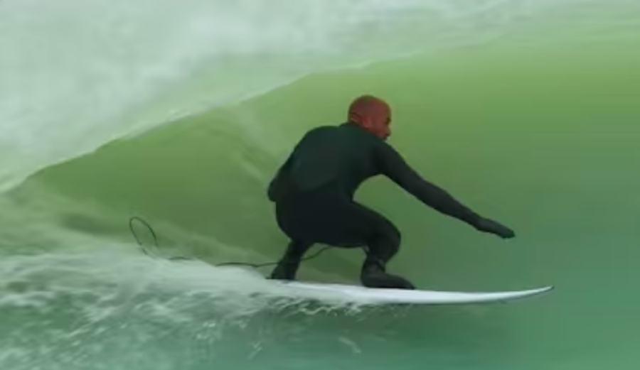 Kelly Slater gets barreled switch at the Surf Ranch.