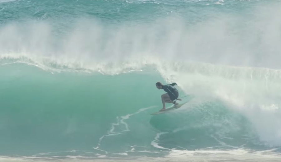 Beau Foster styling through a tepid water closeout on a single fin.