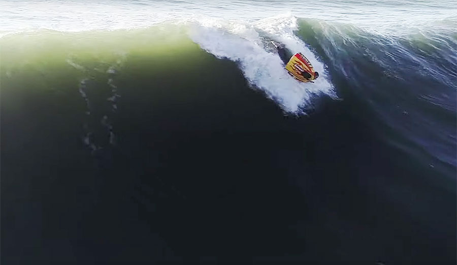Fred David sumo suit surfing at Nazare