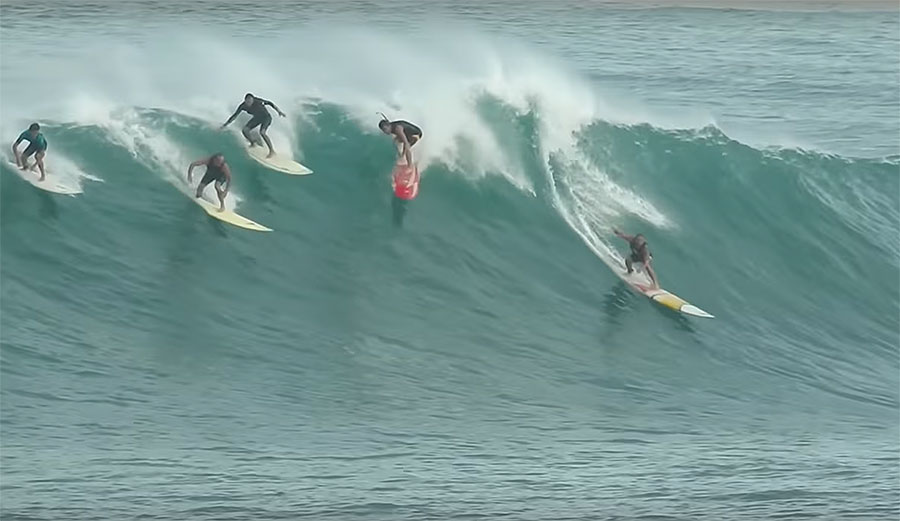 Surfing at Waimea Bay