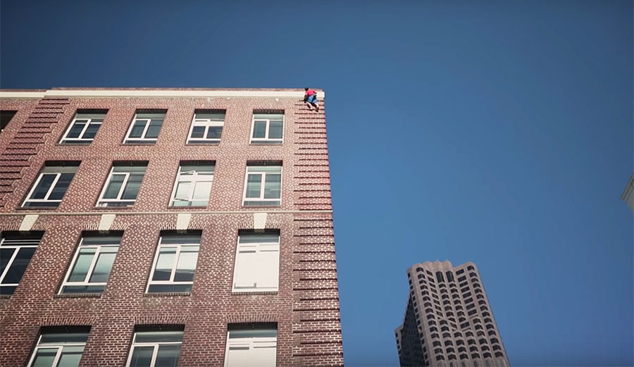 Alex Honnold climbing a building in San Francisco
