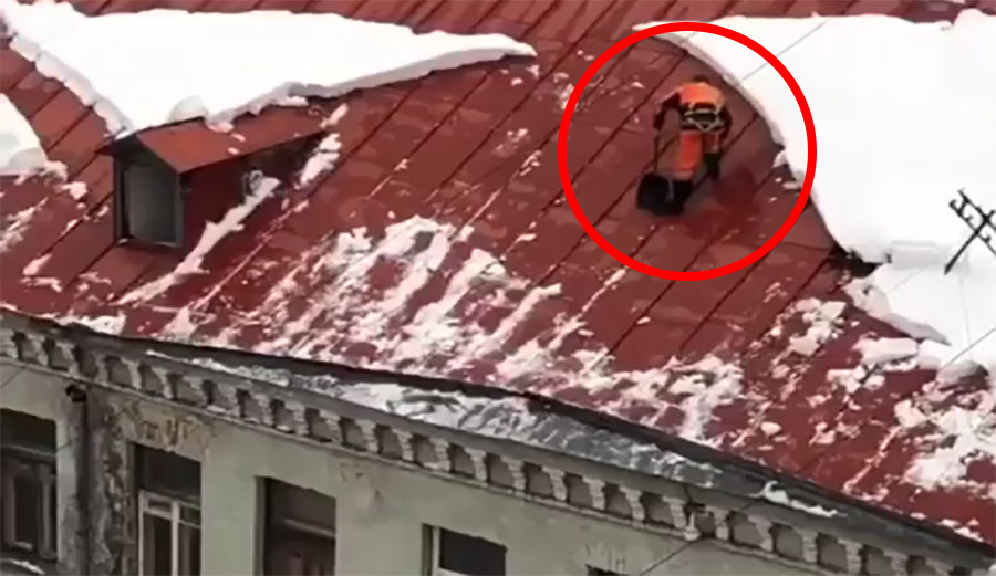 This guy wasn't strapped in while shoveling his roof and fell t