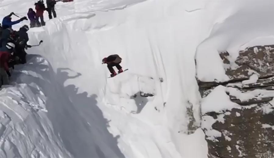 Travis Rice throws a switch 540 into Corbet's Couloir