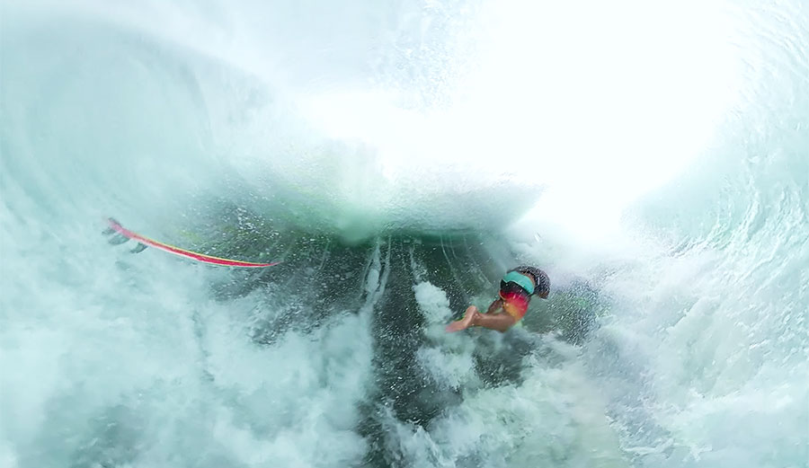 Mikala Jones surfing wipeout