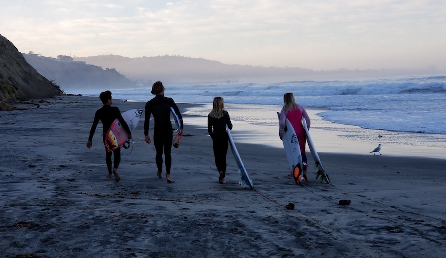 Caitlin Simmers, Kirra Pinkerton, Tanner Waite, and Lucas Owston surfing Blacks.