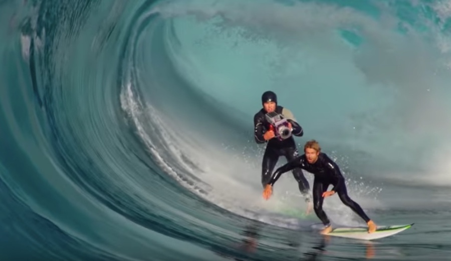 Leroy Bellet chases a surfer with a $100,000 camera that's about to take a beating.