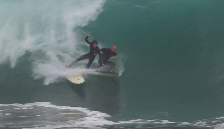 Bodyboarder versus surfer at the Wedge.