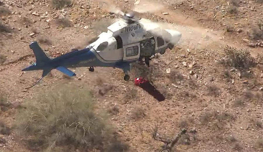 Injured hiker spinning in rescue basket
