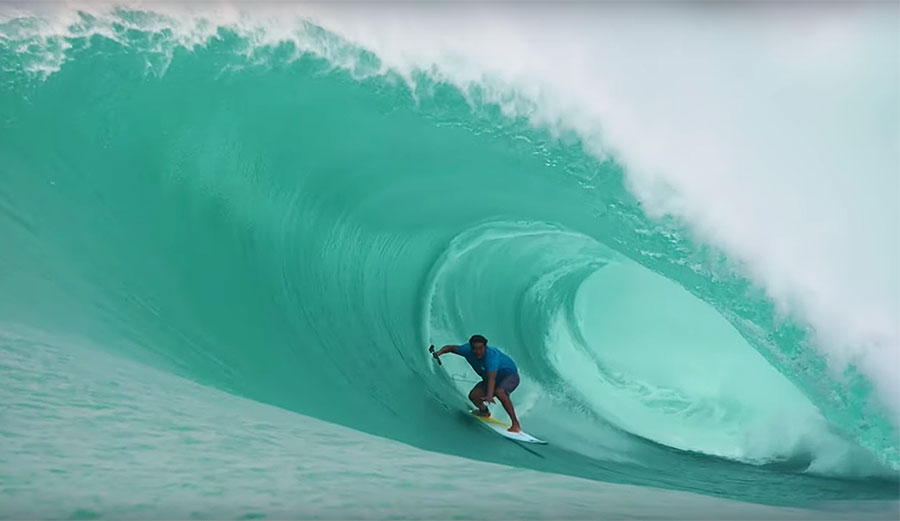 Mikala Jones surfing in Indonesia