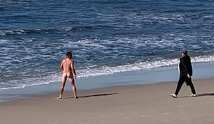 Legendary Father Paddles Spare Board Out to Son Naked During Contest Heat in Oz