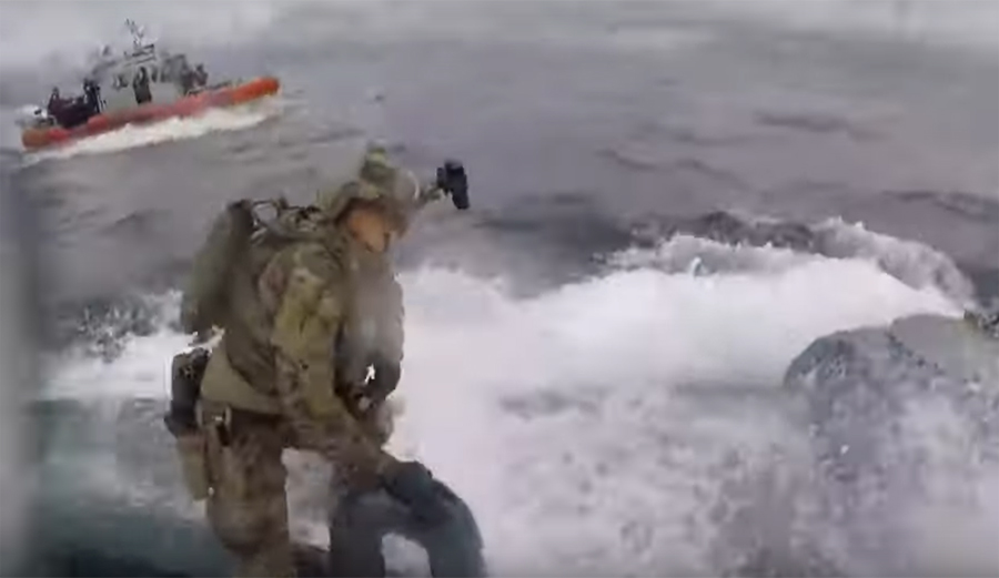 Watch This U.S. Coast Guard Member Surf Suspected Narco-Submarine