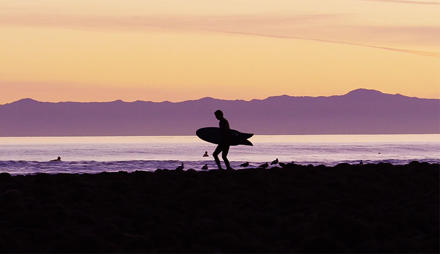 Trevor Gordon with Ryan Lovelace surfboard