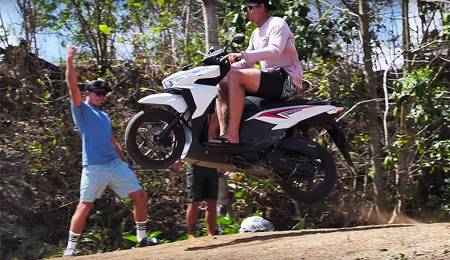 Jamie O'Brien on scooter