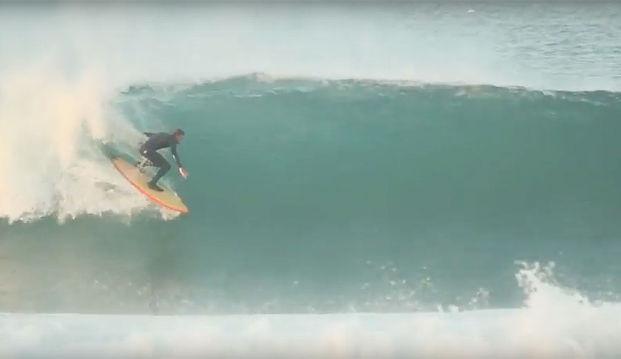 Drew McPherson surfing