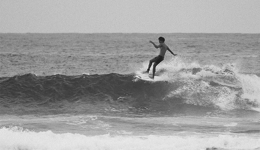 Michael February surfing in Mexico