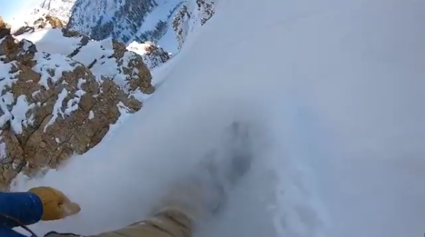 Watch Snowboarder Ride Overhead, Blower Pow Down Alta's Main Chute