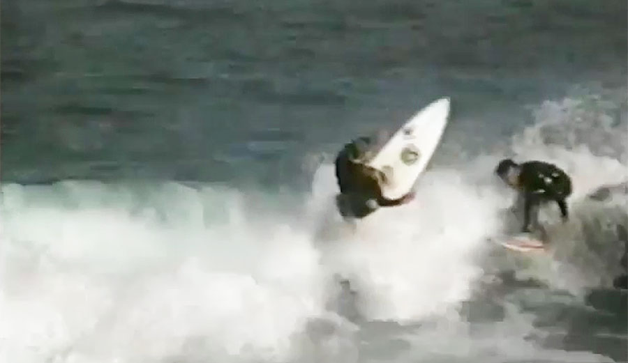 Surfers wiping out