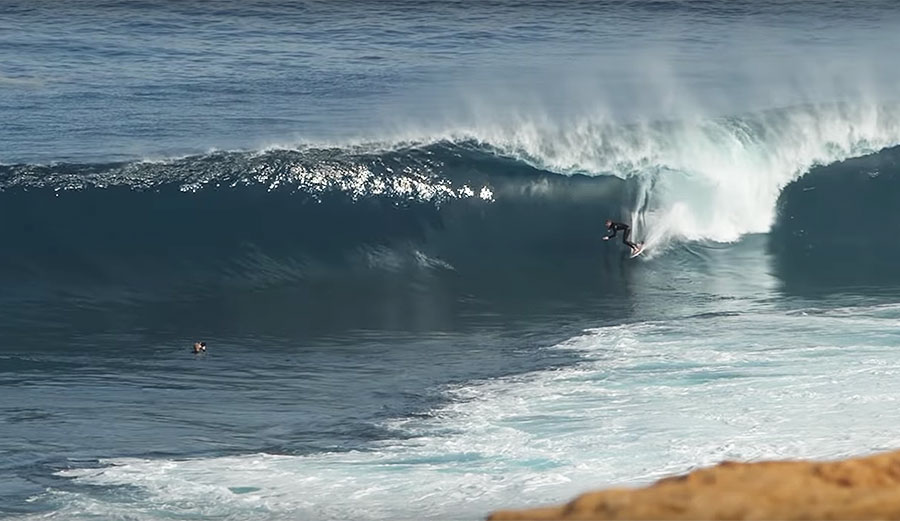 Laurie Towner surfing