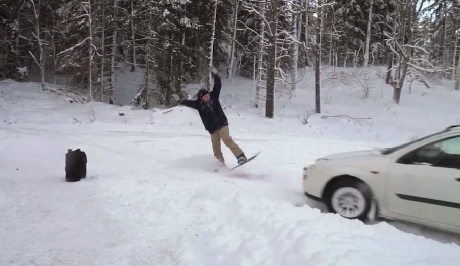 How's This Snowboarder's Backflip Off a Moving Car?