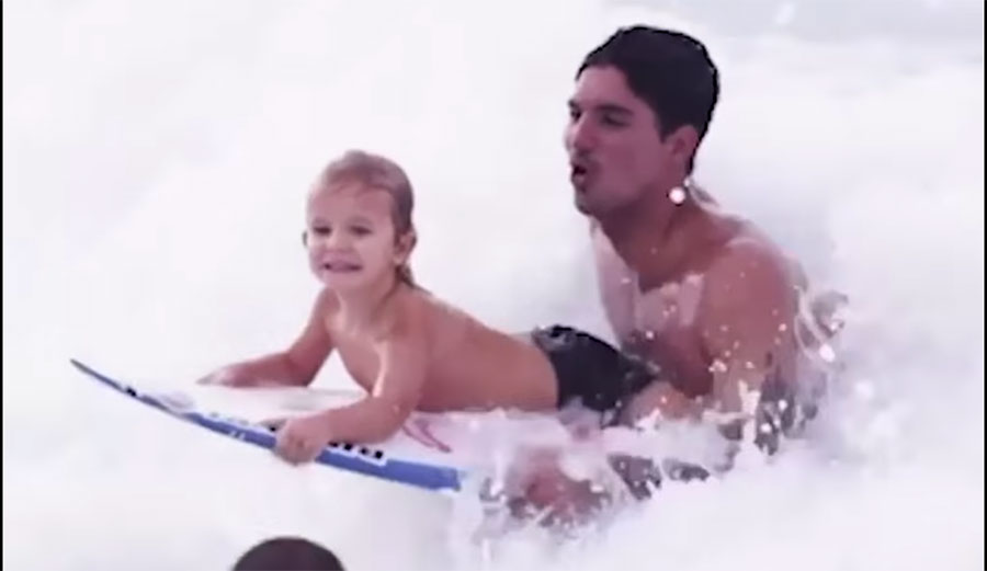 Gabriel Medina surfing with Vali, son of Owen Wright