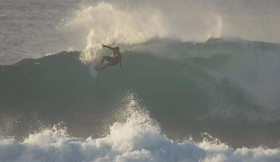 Sunset beach surfing