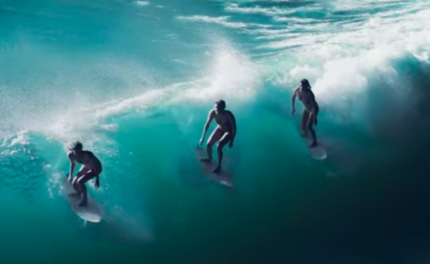 Steph Gilmore, Leah Dawson, and Coco Ho Star in Surfing Art Project Shot at Night