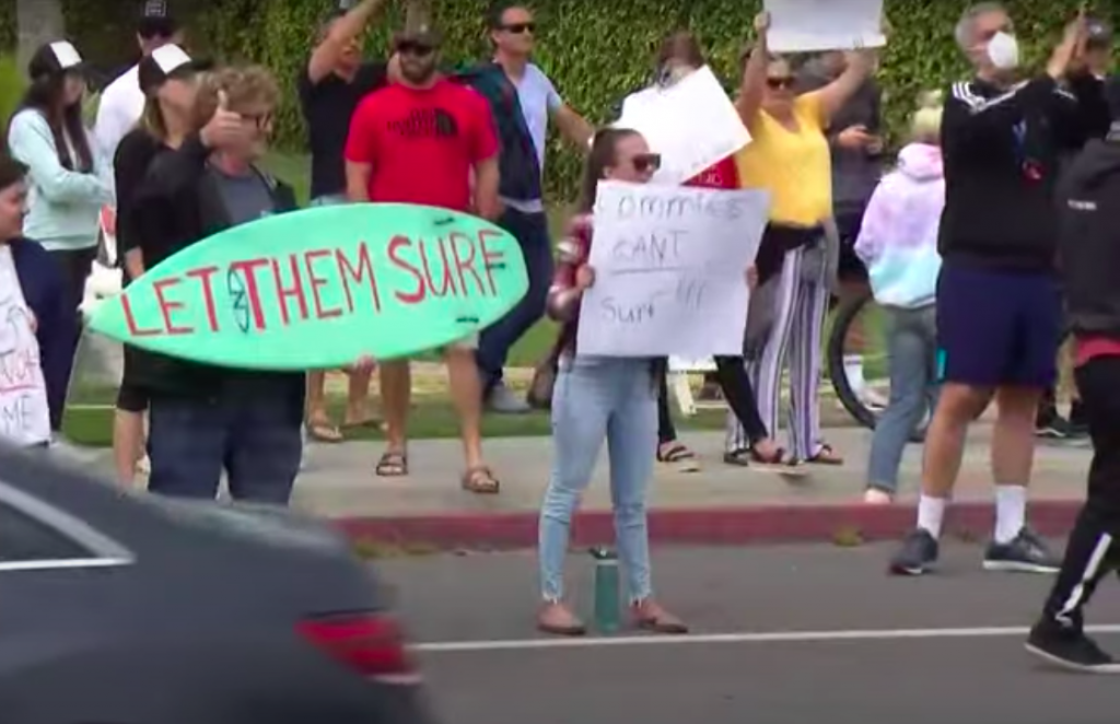 Surfers Gather in Encinitas to Protest Beach and Open Space Closures