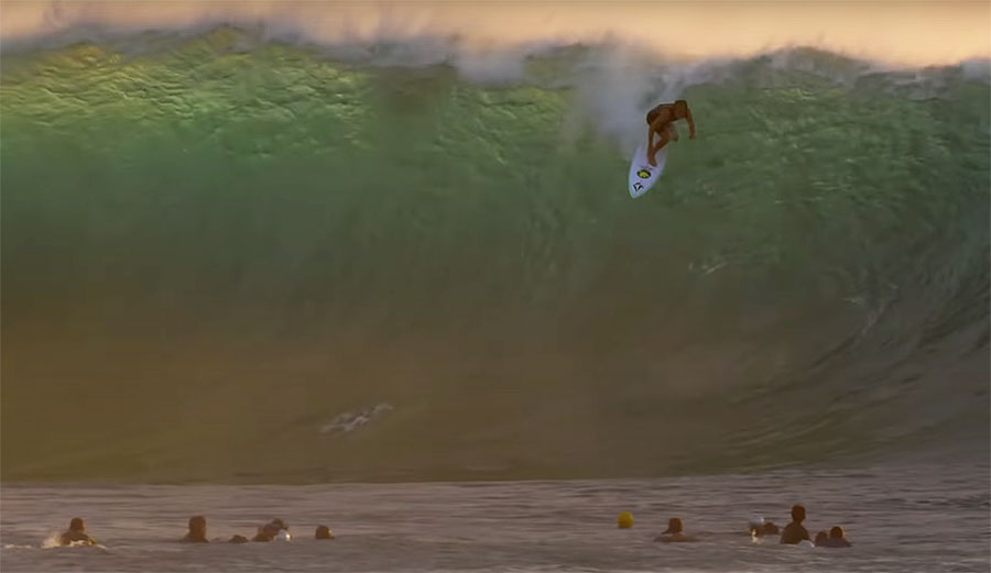 Derek Ho surfing Pipeline