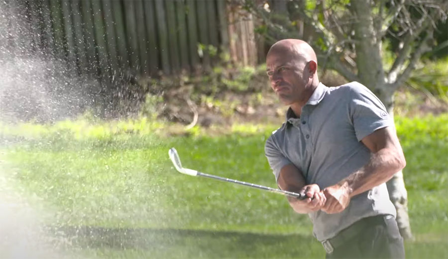 Kelly Slater golfing