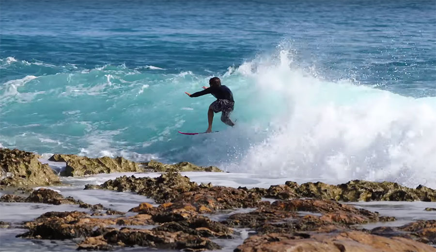 Mason Ho surfing