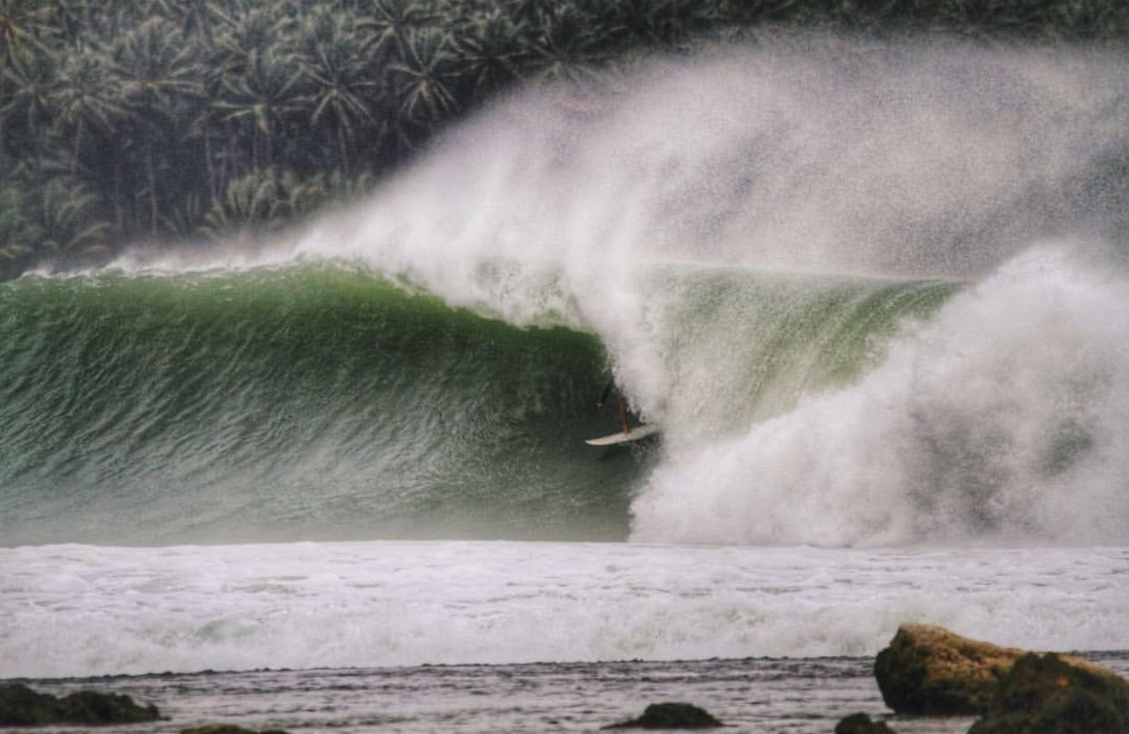 Surfcare cofounder Nick Stolz charging Nias prior to breaking all of his surfboards and deciding to do something about it. Photo: Courtesy Stolz