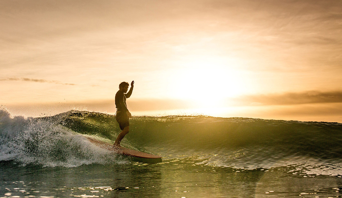 Longboarder at sunset. Photo: ST Images