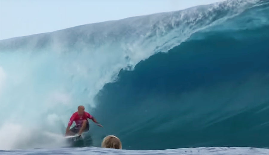 Kelly Slater and John John Florence surfing