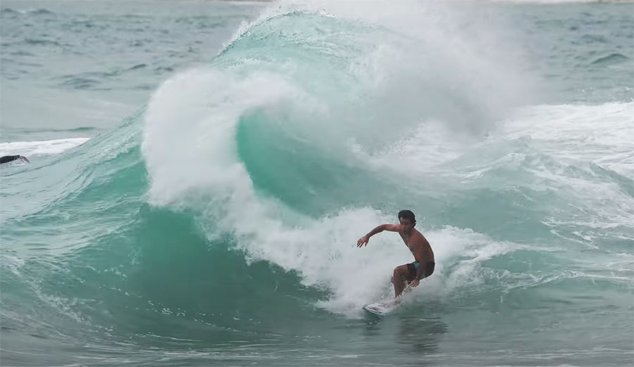 Mason Ho surfing