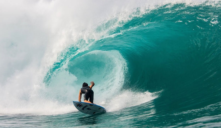 Mason Ho surfing Pipeline