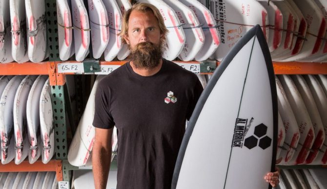 britt merrick with a channel islands surfboard