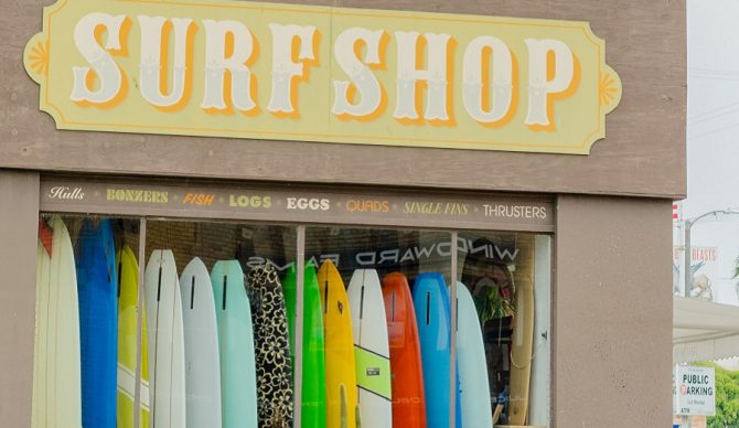surf shop with surfboards in the window