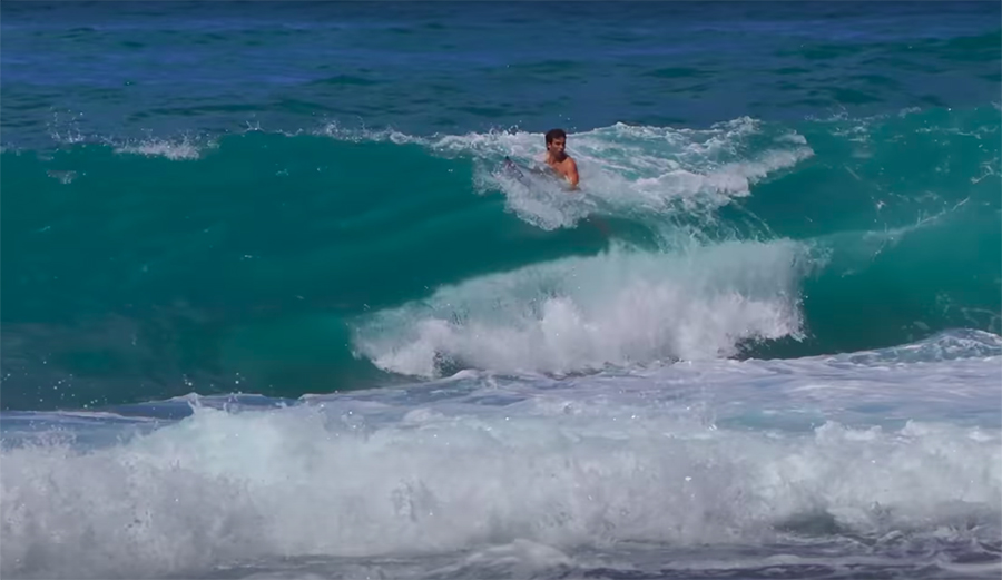 Mason Ho caught in a shorebreak double-up wave